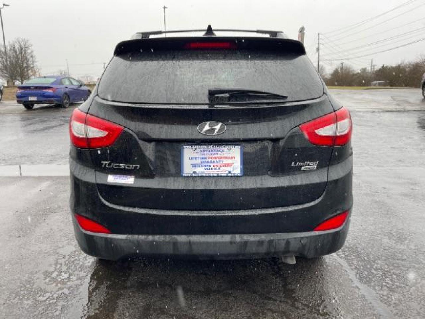 2014 Ash Black Hyundai Tucson GLS AWD (KM8JUCAG3EU) with an 2.4L L4 DOHC 16V engine, 6-Speed Automatic transmission, located at 1099 N County Rd 25A , Troy, OH, 45373, (937) 908-9800, 40.057079, -84.212883 - Photo#4