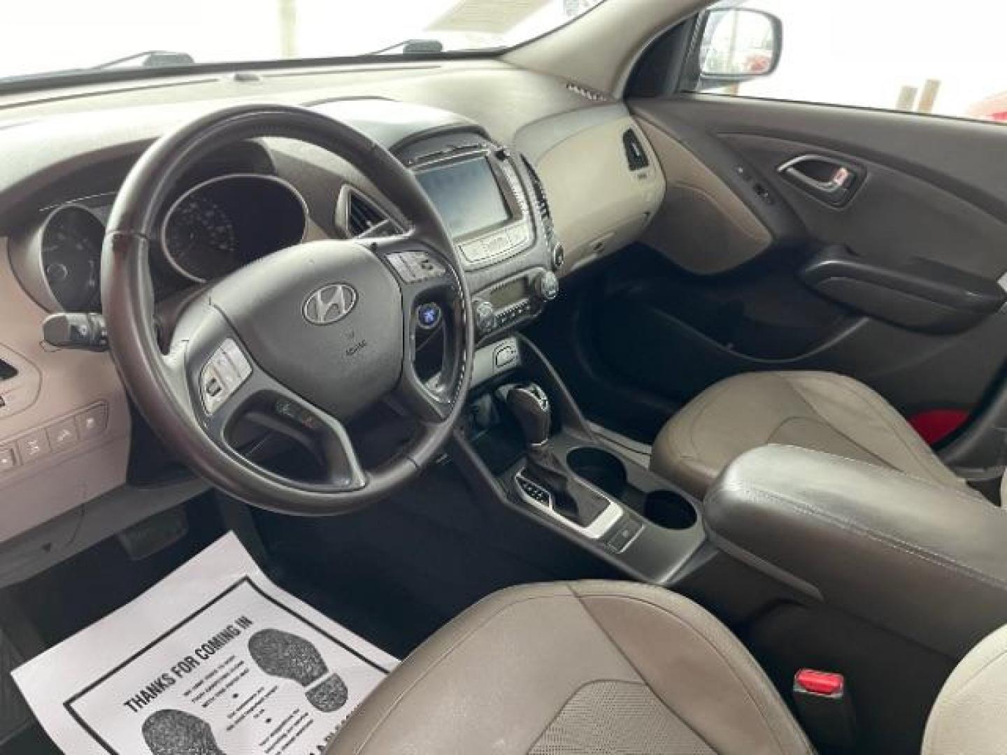 2014 Ash Black Hyundai Tucson GLS AWD (KM8JUCAG3EU) with an 2.4L L4 DOHC 16V engine, 6-Speed Automatic transmission, located at 1099 N County Rd 25A , Troy, OH, 45373, (937) 908-9800, 40.057079, -84.212883 - Photo#6