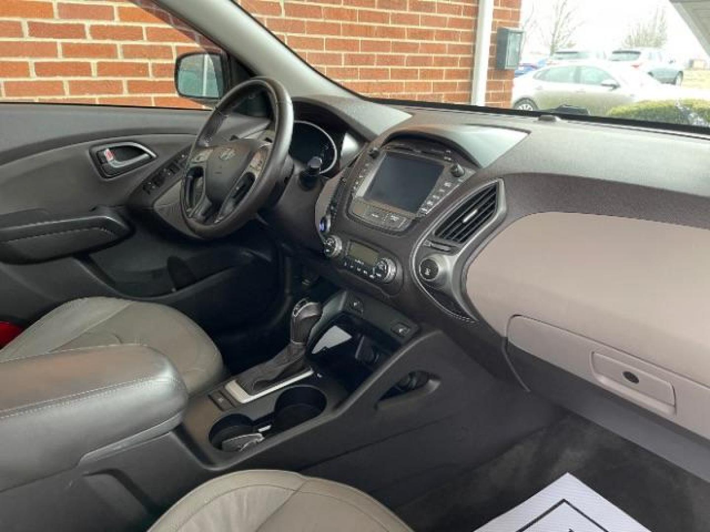 2014 Ash Black Hyundai Tucson GLS AWD (KM8JUCAG3EU) with an 2.4L L4 DOHC 16V engine, 6-Speed Automatic transmission, located at 1099 N County Rd 25A , Troy, OH, 45373, (937) 908-9800, 40.057079, -84.212883 - Photo#8