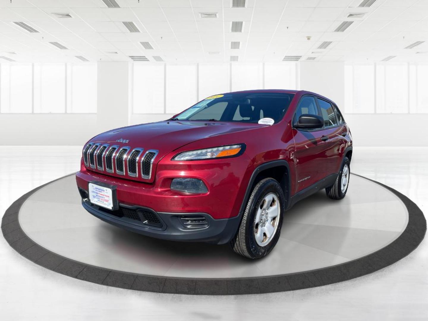 2014 Dp Cherry Red Crystal PC Jeep Cherokee Sport 4WD (1C4PJMAB8EW) with an 2.4L L4 DOHC 16V engine, 9-Speed Automatic transmission, located at 8750 N County Rd 25A, Piqua, OH, 45356, (937) 908-9800, 40.164391, -84.232513 - Photo#7