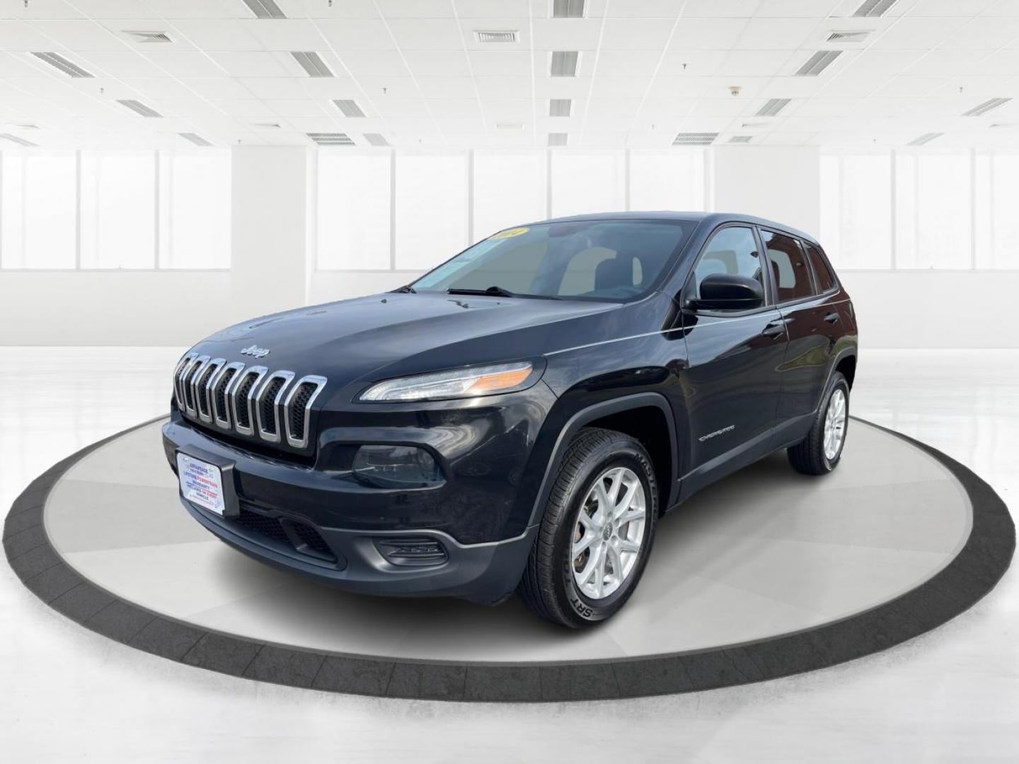 2014 Brilliant Black Crystal P Jeep Cherokee Sport 4WD (1C4PJMAB8EW) with an 2.4L L4 DOHC 16V engine, 9-Speed Automatic transmission, located at 401 Woodman Dr, Riverside, OH, 45431, (937) 908-9800, 39.760899, -84.123421 - Photo#7