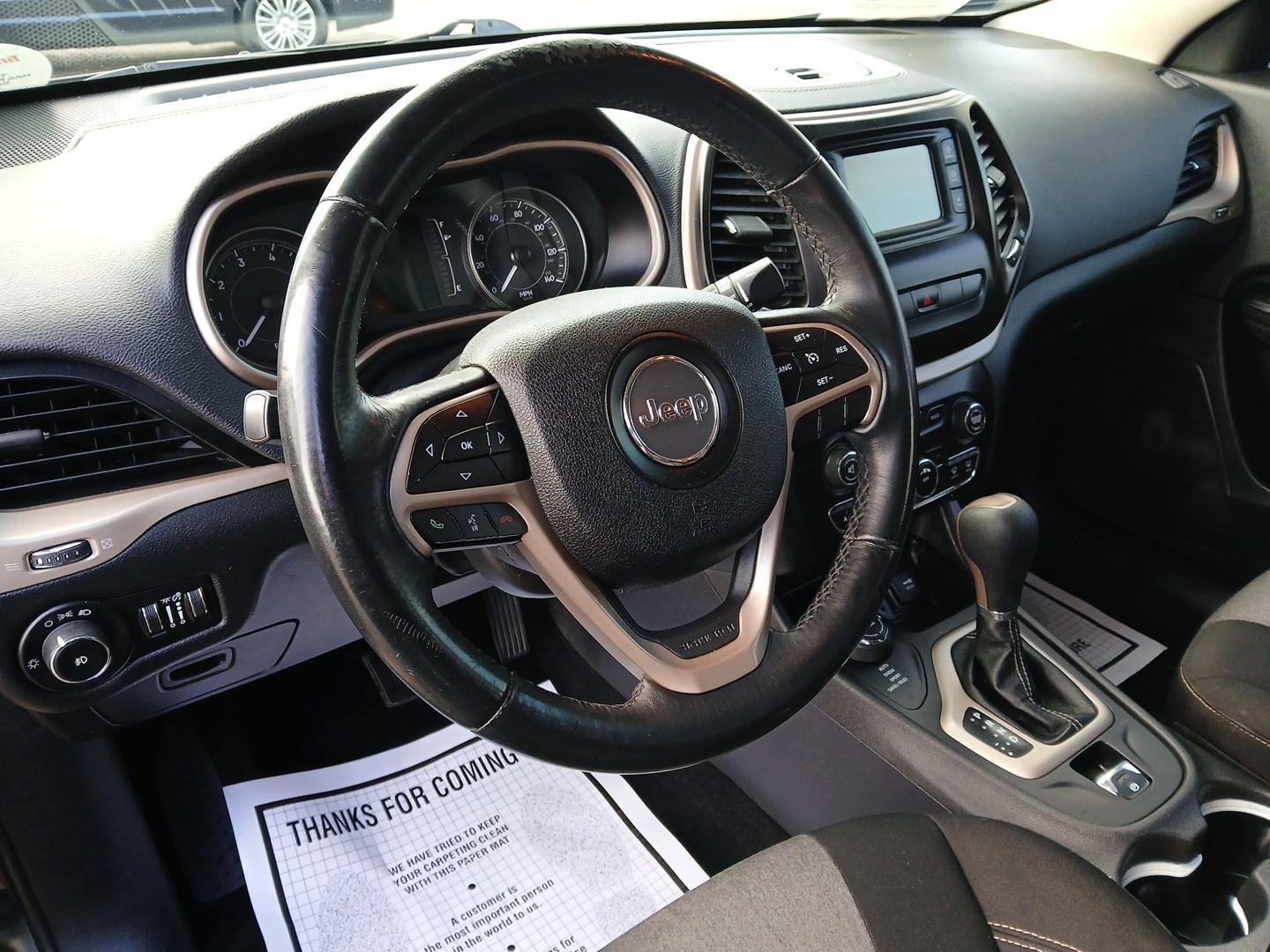 2014 Jeep Cherokee Latitude 4WD (1C4PJMCB6EW) with an 2.4L L4 DOHC 16V engine, 9-Speed Automatic transmission, located at 1230 East Main St, Xenia, OH, 45385, (937) 908-9800, 39.688026, -83.910172 - 2014 Jeep Cherokee Latitude 4WD - Photo#8