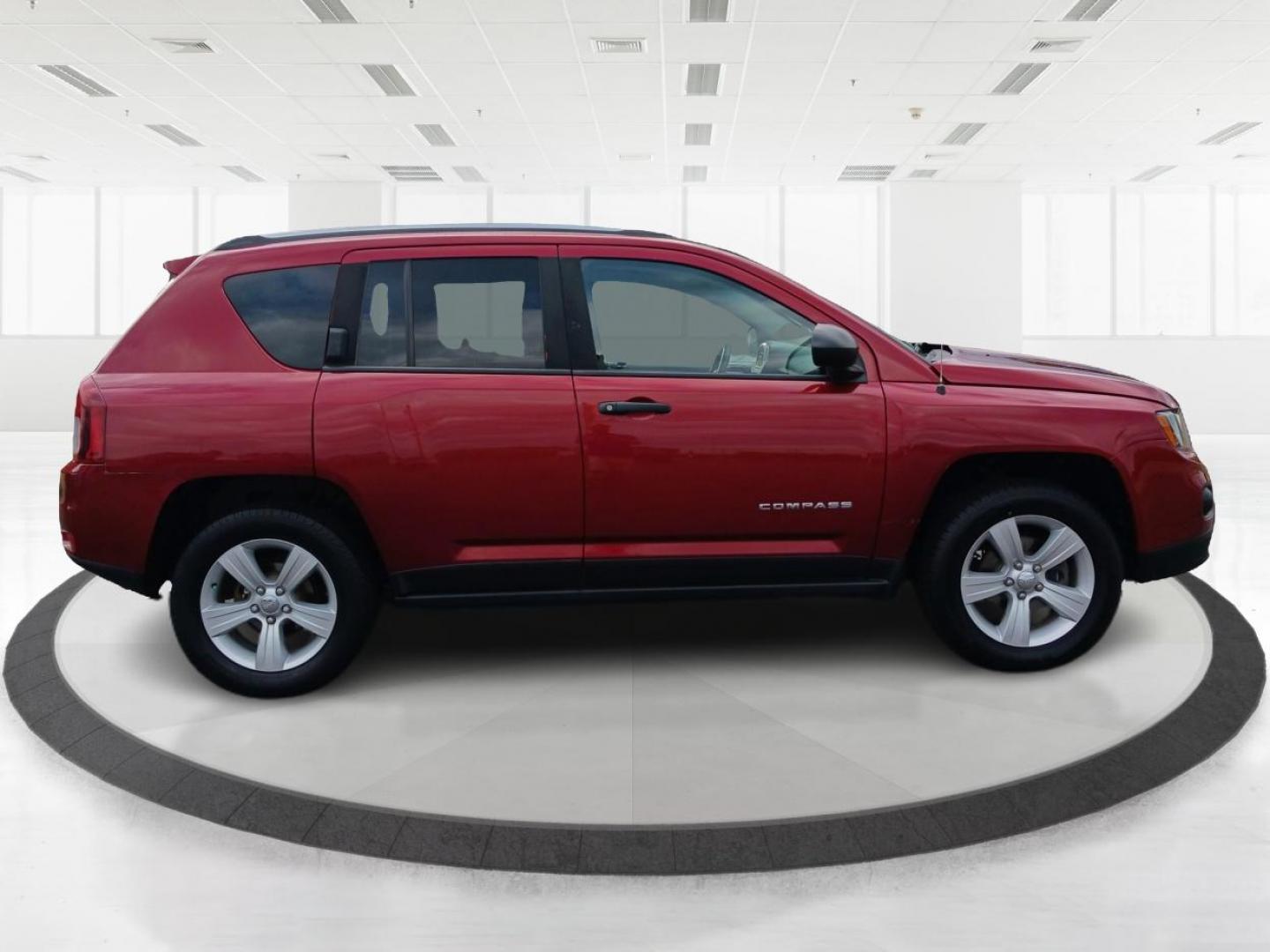 2014 Dp Cherry Red Crystal PC Jeep Compass Sport 4WD (1C4NJDBBXED) with an 2.4L L4 DOHC 16V engine, located at 1951 S Dayton Lakeview Rd., New Carlisle, OH, 45344, (937) 908-9800, 39.890999, -84.050255 - Photo#1