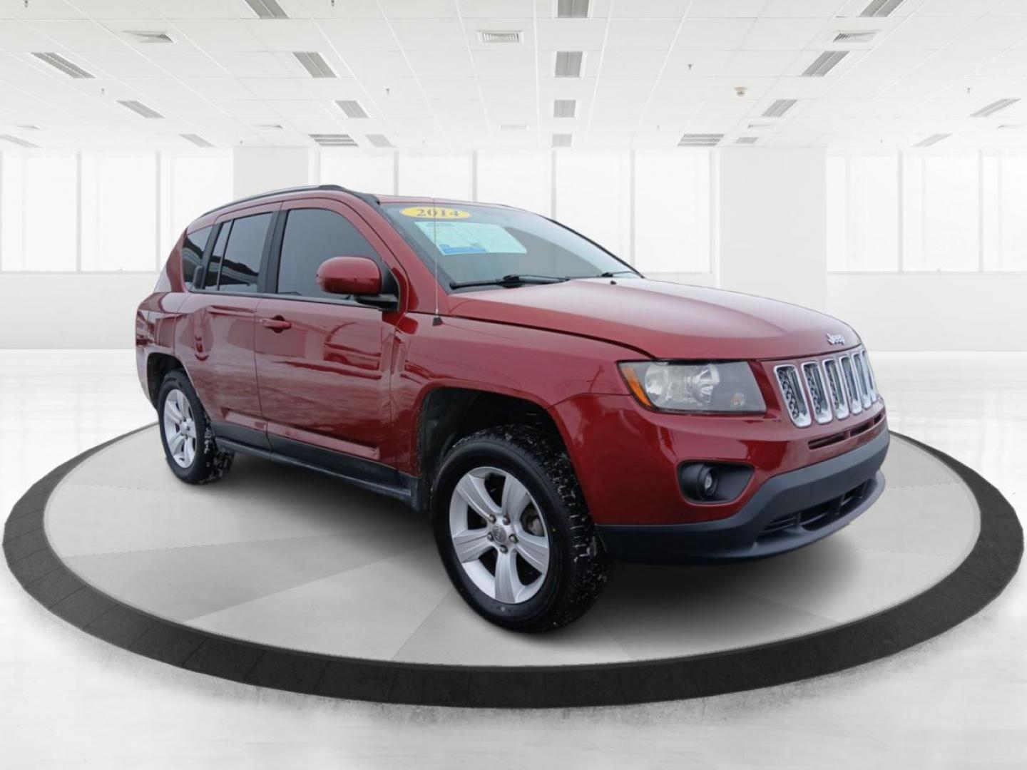 2014 Dp Cherry Red Crystal PC Jeep Compass Latitude 4WD (1C4NJDEB4ED) with an 2.4L L4 DOHC 16V engine, Continuously Variable Transmission transmission, located at 8750 N County Rd 25A, Piqua, OH, 45356, (937) 908-9800, 40.164391, -84.232513 - 2014 Jeep Compass Latitude 4WD - Photo#0