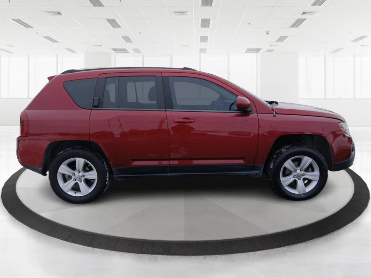 2014 Dp Cherry Red Crystal PC Jeep Compass Latitude 4WD (1C4NJDEB4ED) with an 2.4L L4 DOHC 16V engine, Continuously Variable Transmission transmission, located at 8750 N County Rd 25A, Piqua, OH, 45356, (937) 908-9800, 40.164391, -84.232513 - 2014 Jeep Compass Latitude 4WD - Photo#1