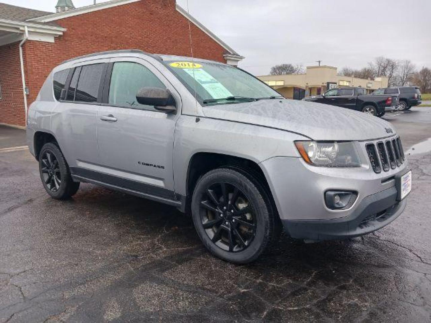 2014 Bright Silver Metallic CC Jeep Compass Sport FWD (1C4NJCBAXED) with an 2.0L L4 DOHC 16V engine, located at 1099 N County Rd 25A , Troy, OH, 45373, (937) 908-9800, 40.057079, -84.212883 - Photo#0