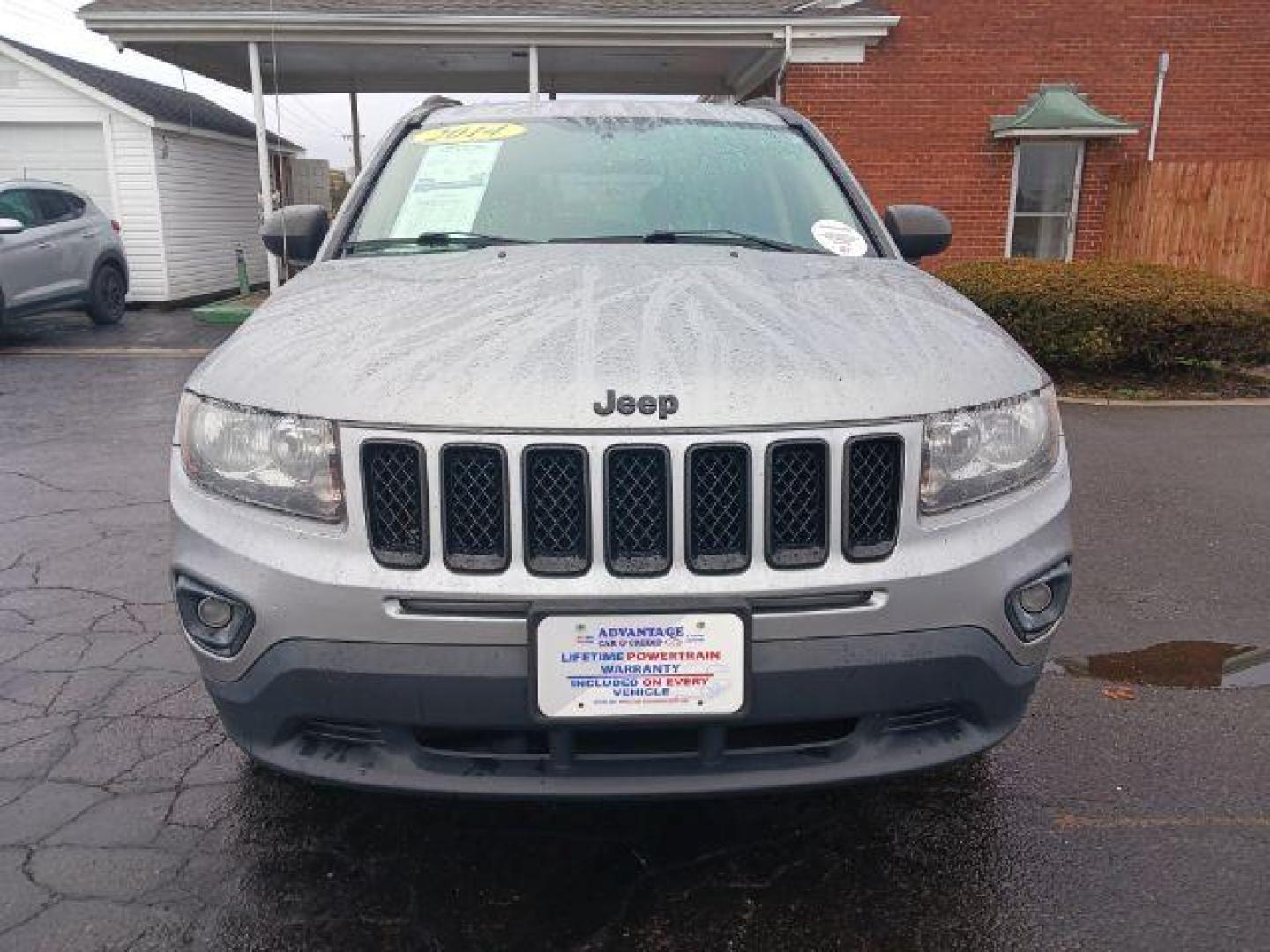 2014 Bright Silver Metallic CC Jeep Compass Sport FWD (1C4NJCBAXED) with an 2.0L L4 DOHC 16V engine, located at 1099 N County Rd 25A , Troy, OH, 45373, (937) 908-9800, 40.057079, -84.212883 - Photo#1