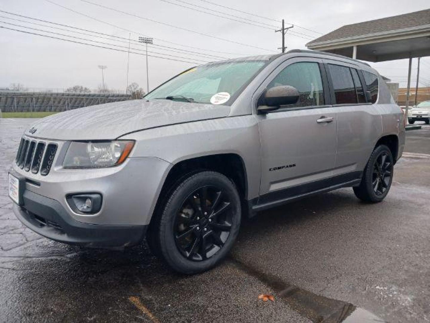 2014 Bright Silver Metallic CC Jeep Compass Sport FWD (1C4NJCBAXED) with an 2.0L L4 DOHC 16V engine, located at 1099 N County Rd 25A , Troy, OH, 45373, (937) 908-9800, 40.057079, -84.212883 - Photo#2