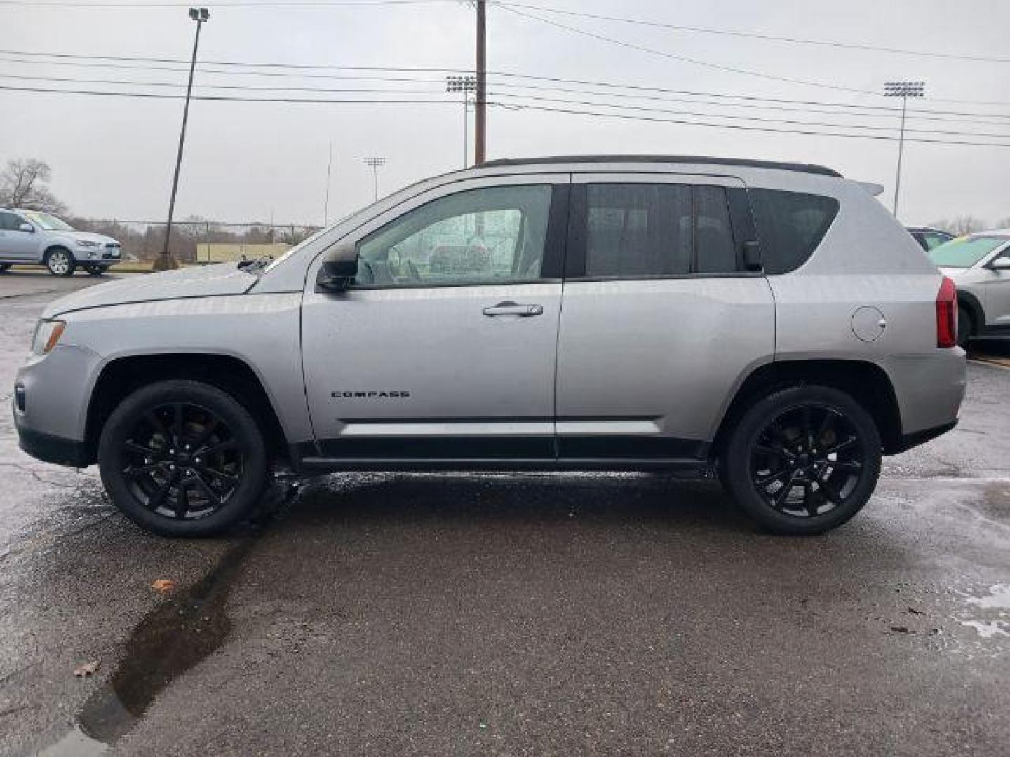 2014 Bright Silver Metallic CC Jeep Compass Sport FWD (1C4NJCBAXED) with an 2.0L L4 DOHC 16V engine, located at 1099 N County Rd 25A , Troy, OH, 45373, (937) 908-9800, 40.057079, -84.212883 - Photo#3