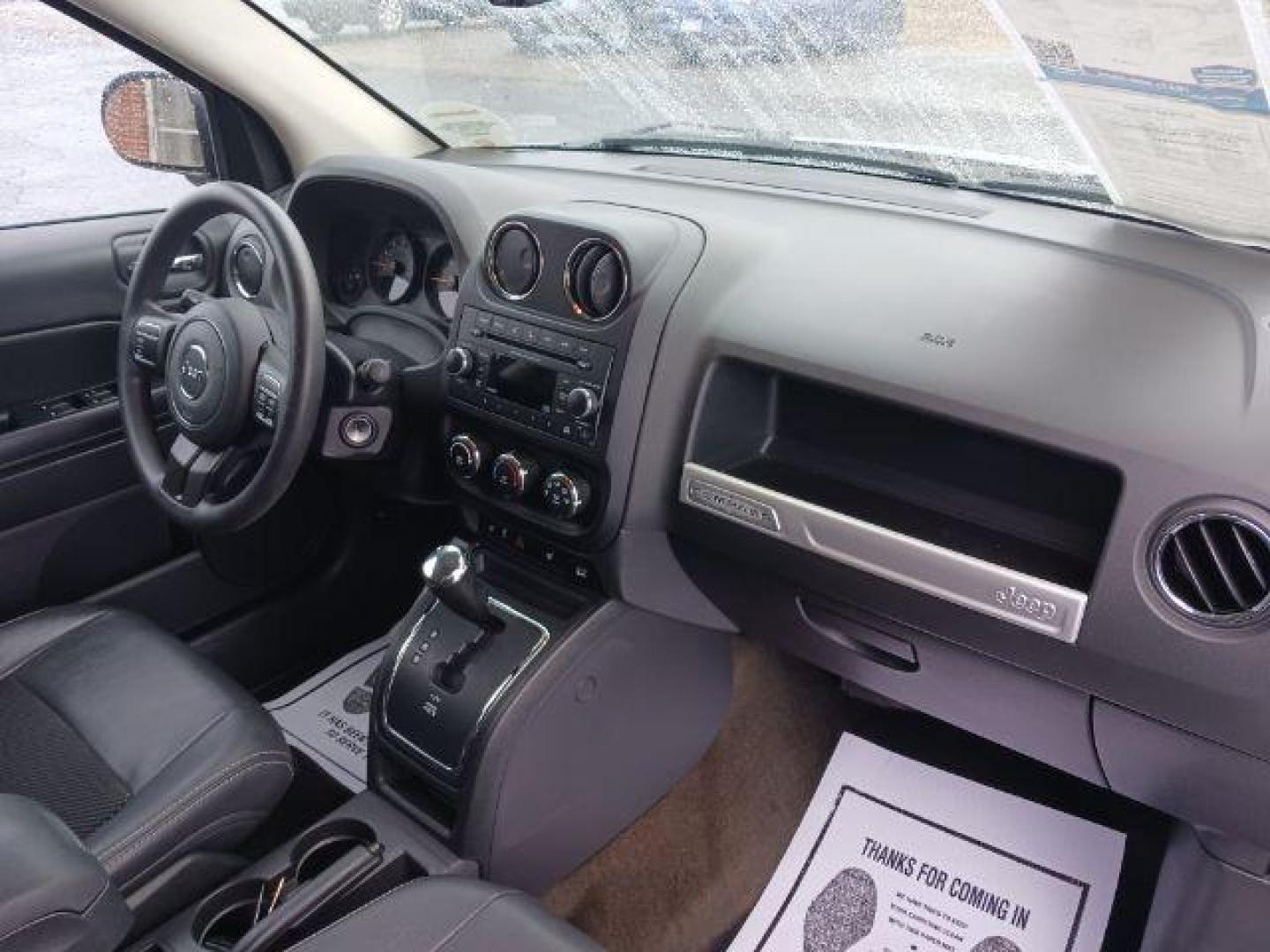 2014 Bright Silver Metallic CC Jeep Compass Sport FWD (1C4NJCBAXED) with an 2.0L L4 DOHC 16V engine, located at 1099 N County Rd 25A , Troy, OH, 45373, (937) 908-9800, 40.057079, -84.212883 - Photo#8