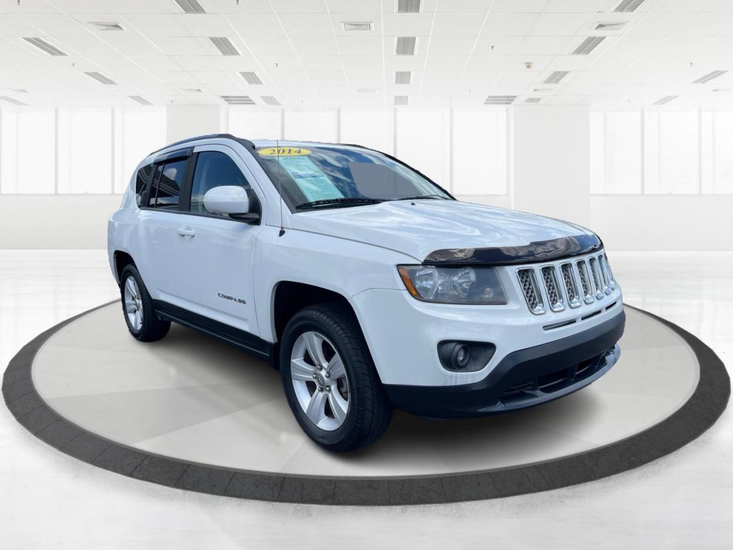 2014 Bright White Clearcoat Jeep Compass Latitude 4WD (1C4NJDEB8ED) with an 2.4L L4 DOHC 16V engine, Continuously Variable Transmission transmission, located at 1099 N County Rd 25A , Troy, OH, 45373, (937) 908-9800, 40.057079, -84.212883 - Photo#0