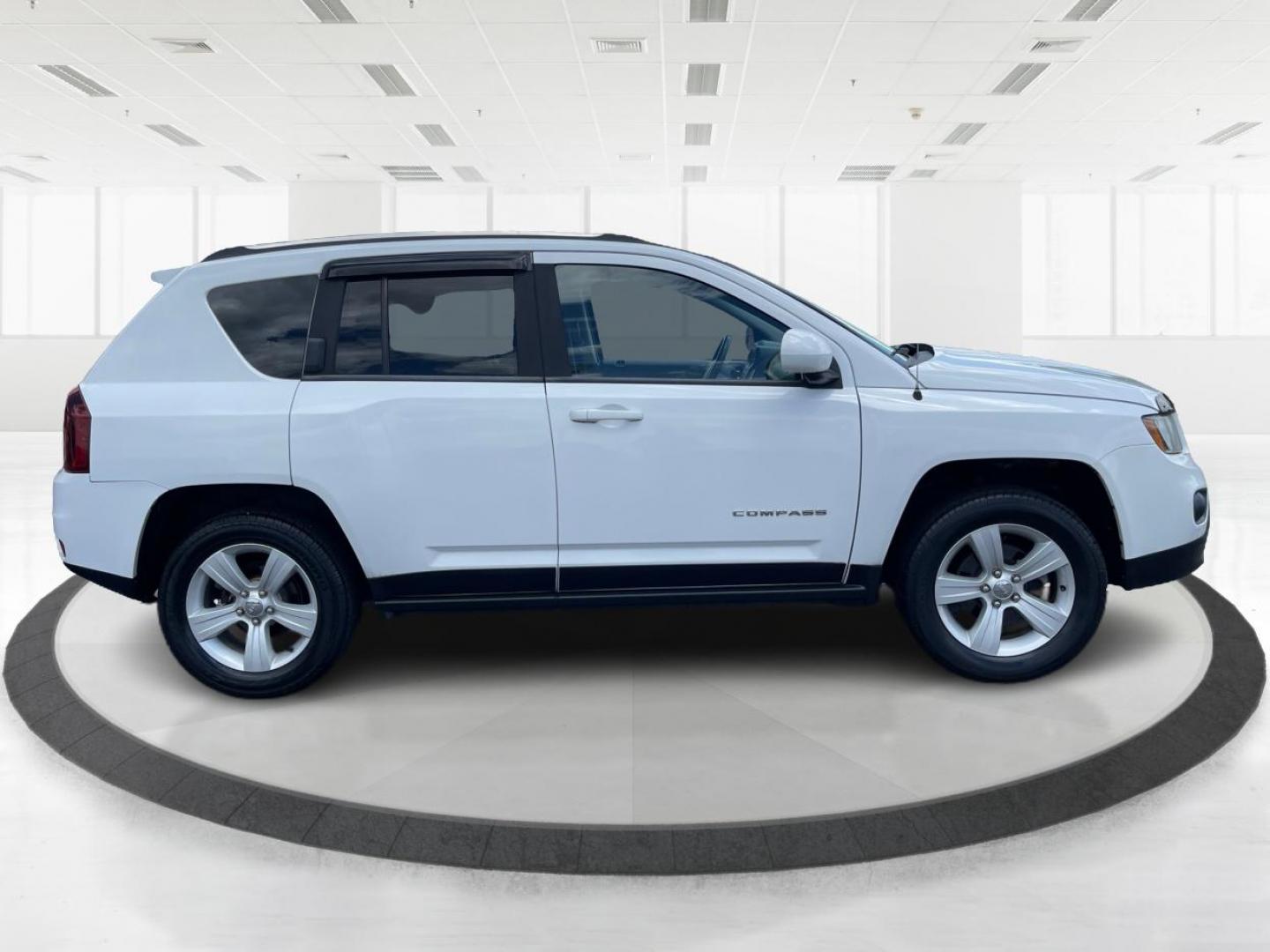 2014 Bright White Clearcoat Jeep Compass Latitude 4WD (1C4NJDEB8ED) with an 2.4L L4 DOHC 16V engine, Continuously Variable Transmission transmission, located at 1099 N County Rd 25A , Troy, OH, 45373, (937) 908-9800, 40.057079, -84.212883 - Photo#1