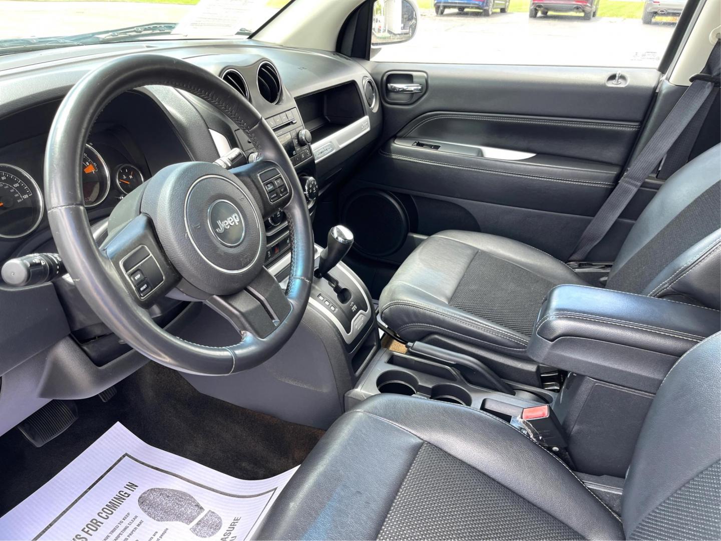 2014 Bright White Clearcoat Jeep Compass Latitude 4WD (1C4NJDEB8ED) with an 2.4L L4 DOHC 16V engine, Continuously Variable Transmission transmission, located at 1099 N County Rd 25A , Troy, OH, 45373, (937) 908-9800, 40.057079, -84.212883 - Photo#8