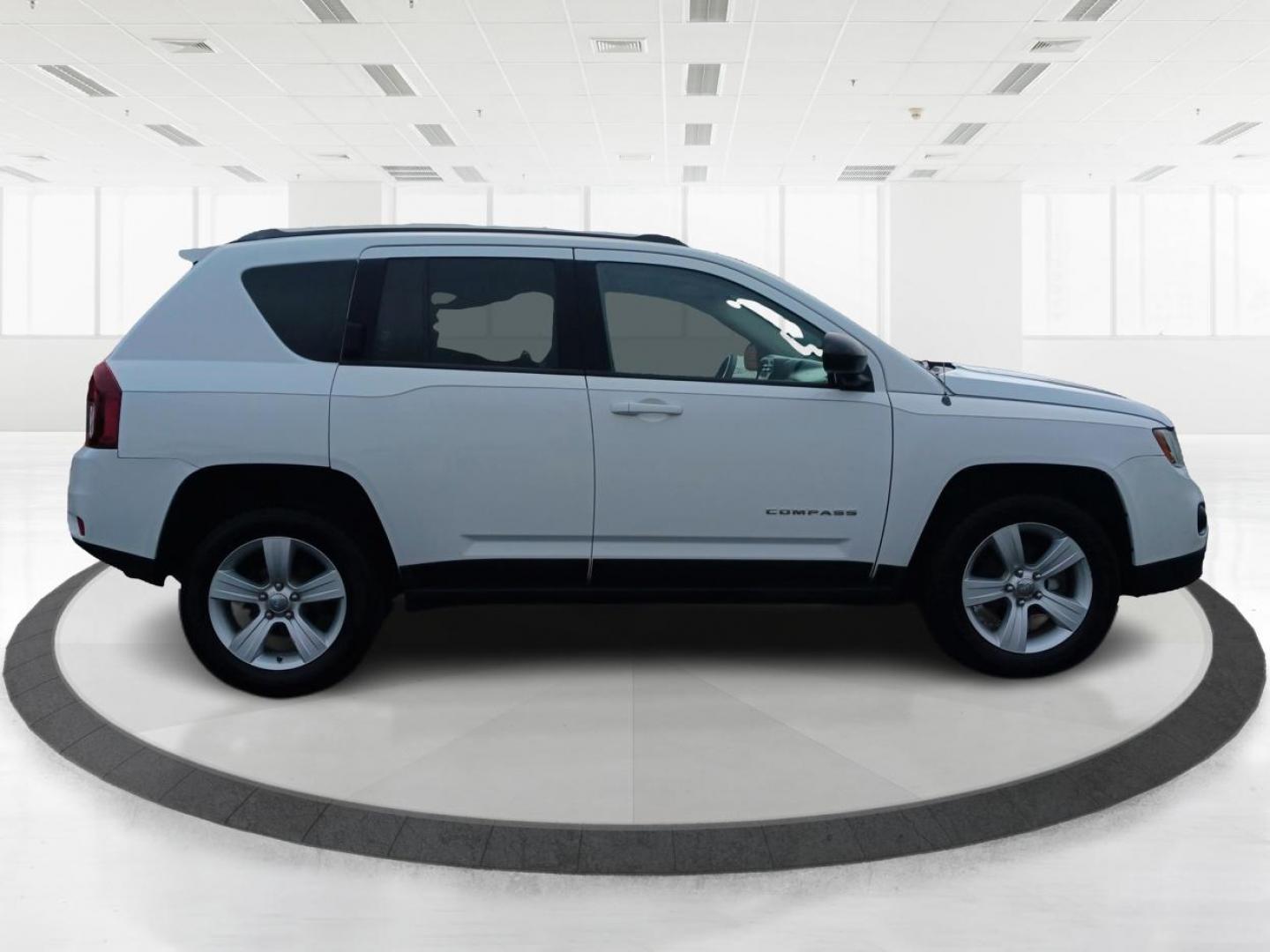 2014 Winter Chill Pearlcoat Jeep Compass (1C4NJDBB1ED) with an 2.4L L4 DOHC 16V engine, located at 880 E. National Road, Vandalia, OH, 45377, (937) 908-9800, 39.891918, -84.183594 - Photo#0