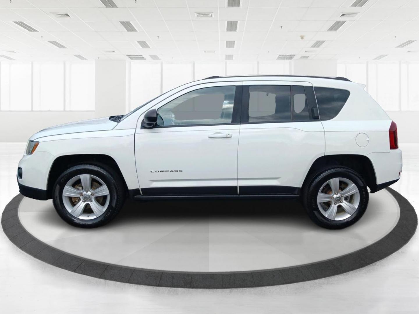 2014 Winter Chill Pearlcoat Jeep Compass (1C4NJDBB1ED) with an 2.4L L4 DOHC 16V engine, located at 880 E. National Road, Vandalia, OH, 45377, (937) 908-9800, 39.891918, -84.183594 - Photo#3