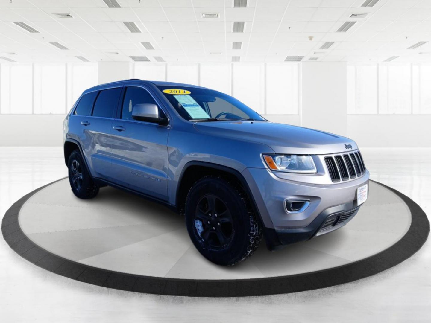 2014 Jeep Grand Cherokee Laredo 4WD (1C4RJFAG1EC) with an 3.6L V6 DOHC 24V engine, 5-Speed Automatic transmission, located at 880 E. National Road, Vandalia, OH, 45377, (937) 908-9800, 39.891918, -84.183594 - Photo#0