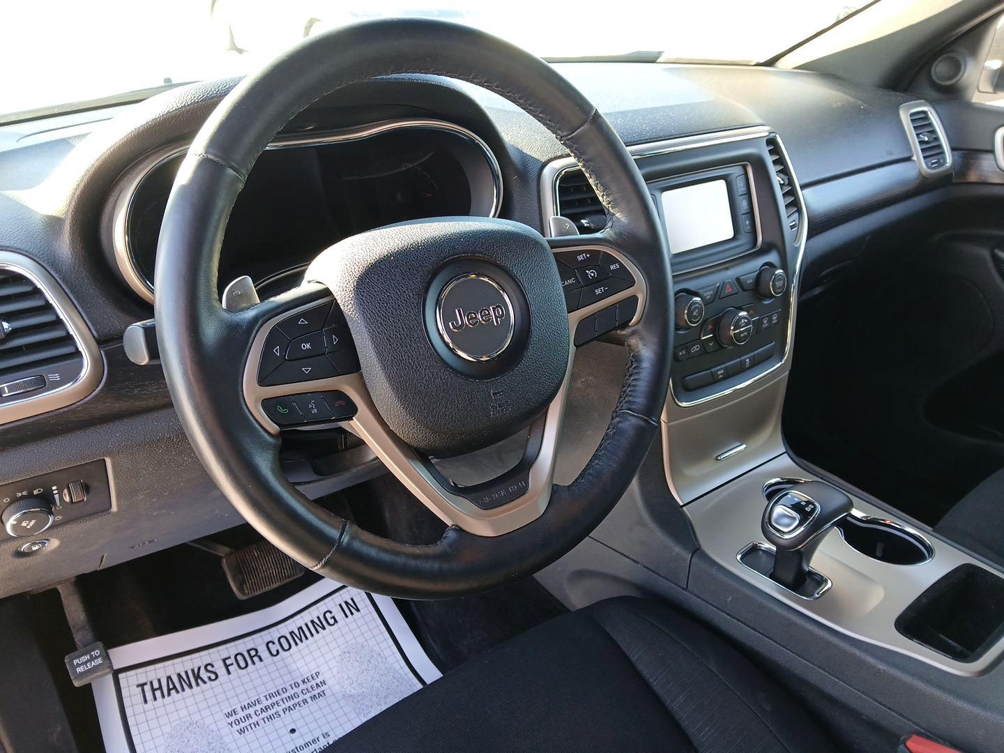 2014 Jeep Grand Cherokee Laredo 4WD (1C4RJFAG1EC) with an 3.6L V6 DOHC 24V engine, 5-Speed Automatic transmission, located at 880 E. National Road, Vandalia, OH, 45377, (937) 908-9800, 39.891918, -84.183594 - Photo#7