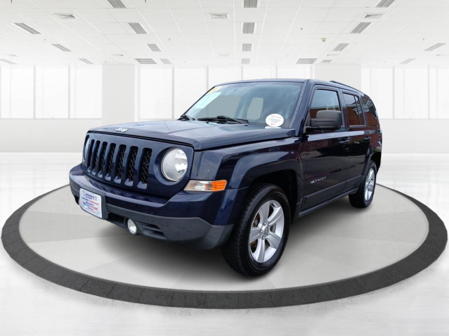 2014 True Blue Pearlcoat Jeep Patriot (1C4NJRBB3ED) with an 2.4L L4 DOHC 16V engine, located at 4508 South Dixie Dr, Moraine, OH, 45439, (937) 908-9800, 39.689976, -84.218452 - Photo#7