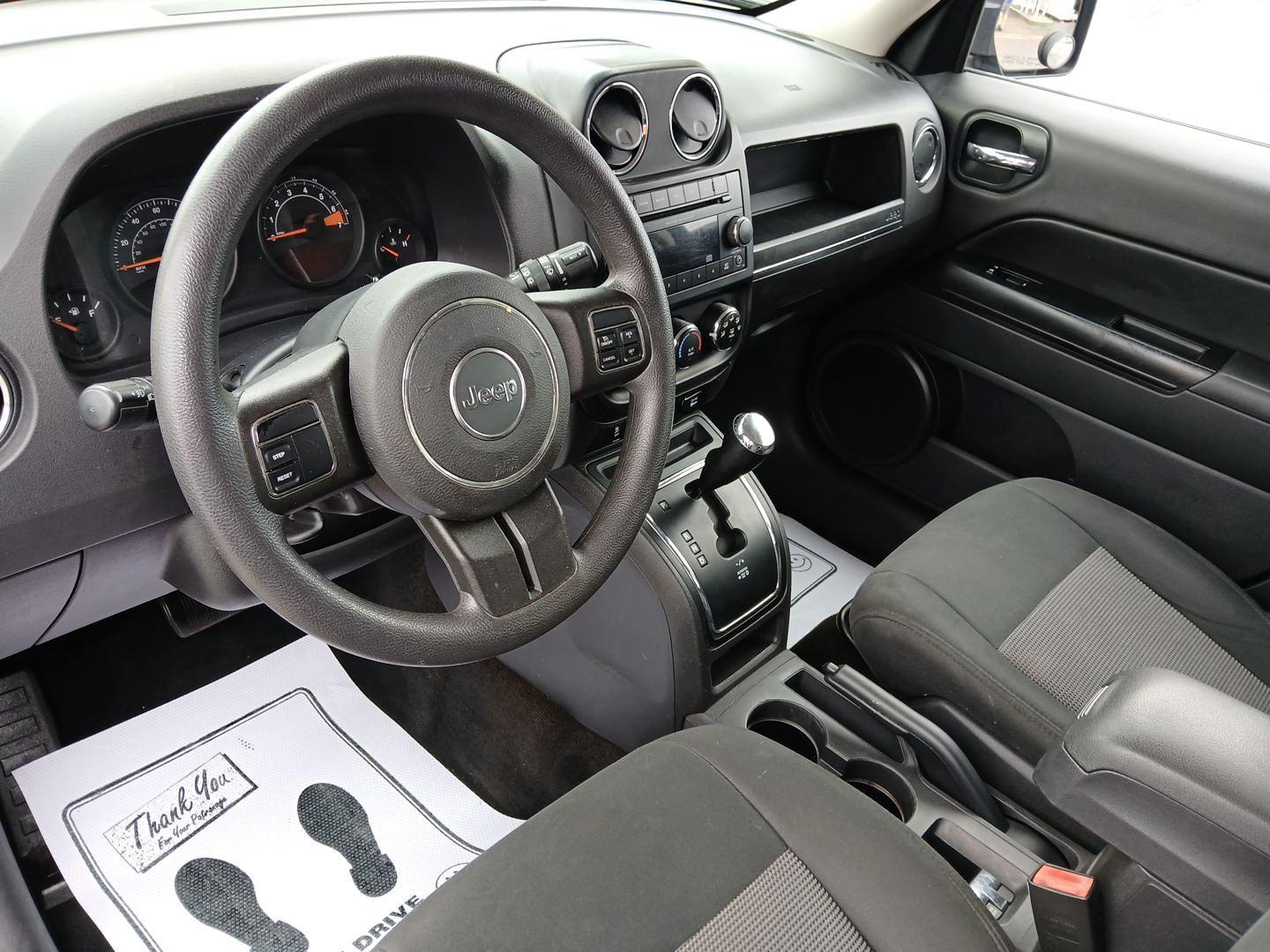 2014 True Blue Pearlcoat Jeep Patriot (1C4NJRBB3ED) with an 2.4L L4 DOHC 16V engine, located at 4508 South Dixie Dr, Moraine, OH, 45439, (937) 908-9800, 39.689976, -84.218452 - Photo#8