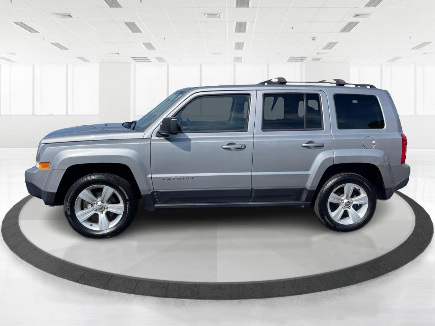 2014 Bright Silver Metallic CC Jeep Patriot Latitude 4WD (1C4NJRFB2ED) with an 2.4L L4 DOHC 16V engine, located at 1951 S Dayton Lakeview Rd., New Carlisle, OH, 45344, (937) 908-9800, 39.890999, -84.050255 - Photo#5