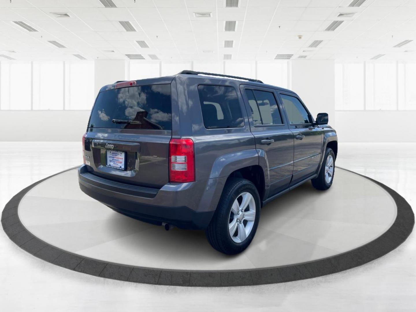 2014 Granite Crystal Met CC Jeep Patriot Sport 4WD (1C4NJRBB8ED) with an 2.4L L4 DOHC 16V engine, located at 401 Woodman Dr, Riverside, OH, 45431, (937) 908-9800, 39.760899, -84.123421 - Photo#2