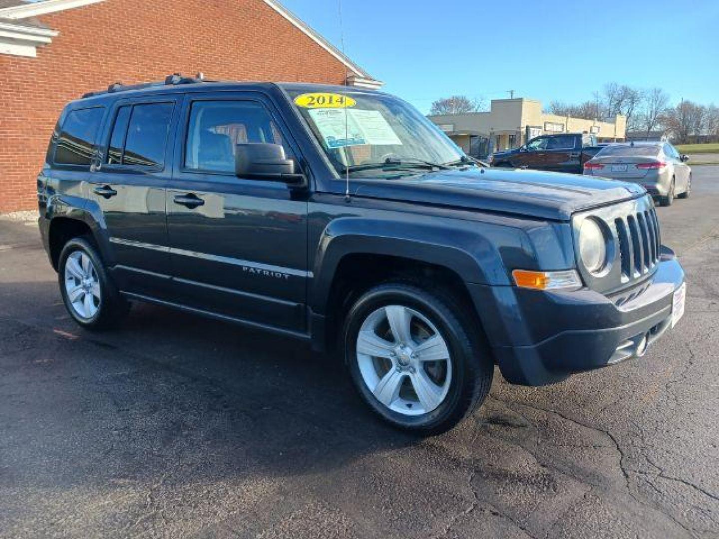 2014 Mineral Gray Metallic CC Jeep Patriot Limited 2WD (1C4NJPCB1ED) with an 2.4L L4 DOHC 16V engine, located at 880 E. National Road, Vandalia, OH, 45377, (937) 908-9800, 39.891918, -84.183594 - Photo#0