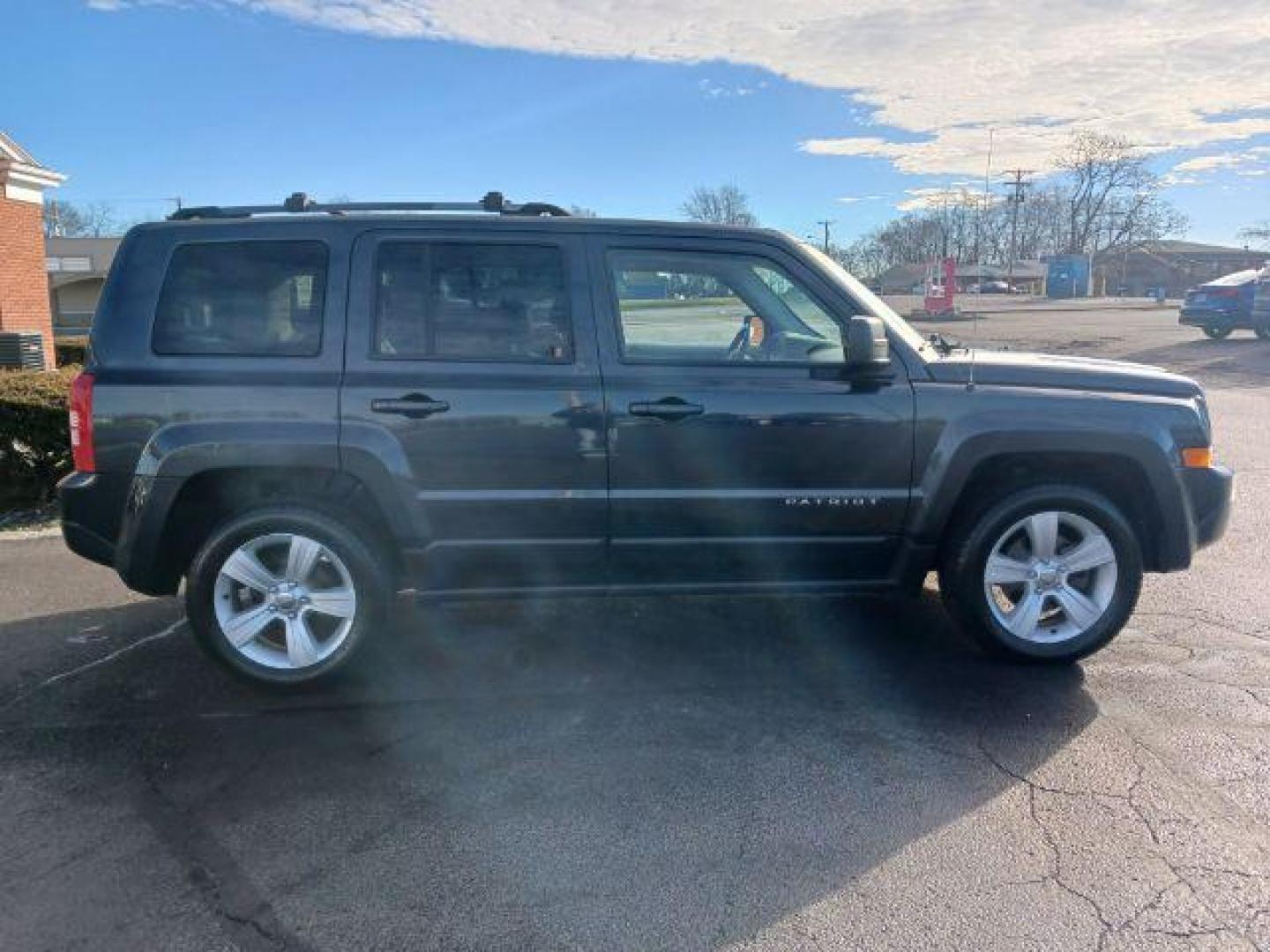 2014 Mineral Gray Metallic CC Jeep Patriot Limited 2WD (1C4NJPCB1ED) with an 2.4L L4 DOHC 16V engine, located at 880 E. National Road, Vandalia, OH, 45377, (937) 908-9800, 39.891918, -84.183594 - Photo#4