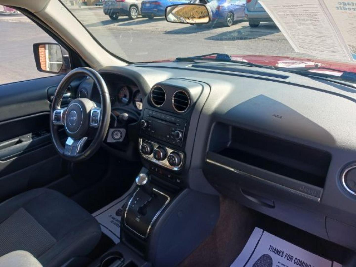 2014 Dp Cherry Red Crystal PC Jeep Patriot (1C4NJRFB0ED) with an 2.4L L4 DOHC 16V engine, located at 401 Woodman Dr, Riverside, OH, 45431, (937) 908-9800, 39.760899, -84.123421 - Photo#15