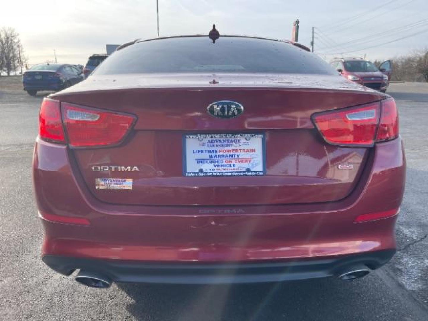 2014 Remington Red Metallic Kia Optima LX (5XXGM4A72EG) with an 2.4L L4 DOHC 16V engine, 6-Speed Automatic transmission, located at 401 Woodman Dr, Riverside, OH, 45431, (937) 908-9800, 39.760899, -84.123421 - Photo#3