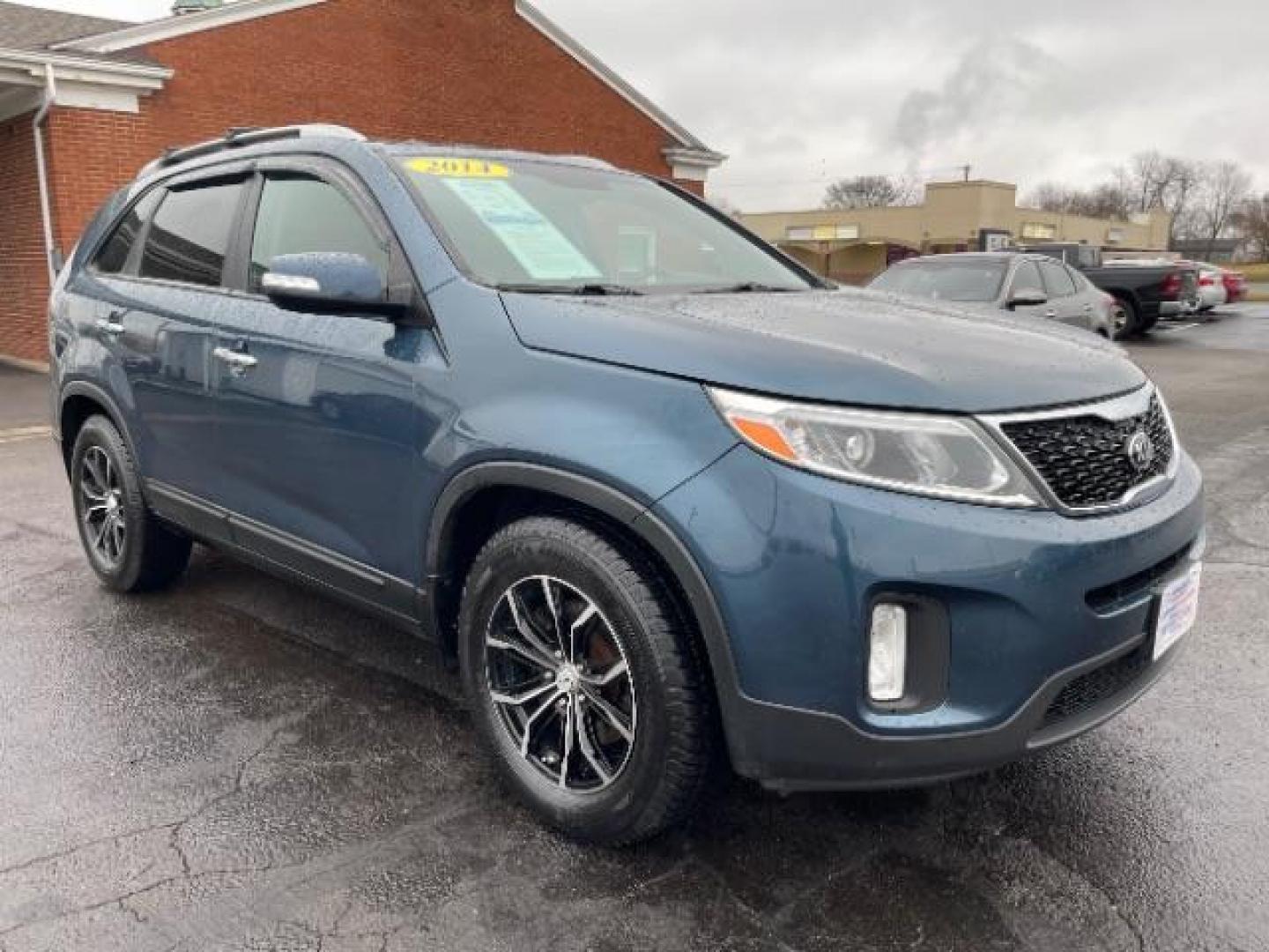 2014 Blue Kia Sorento LX 2WD (5XYKT3A64EG) with an 2.4L L4 DOHC 16V engine, 6-Speed Automatic transmission, located at 1099 N County Rd 25A , Troy, OH, 45373, (937) 908-9800, 40.057079, -84.212883 - Photo#0