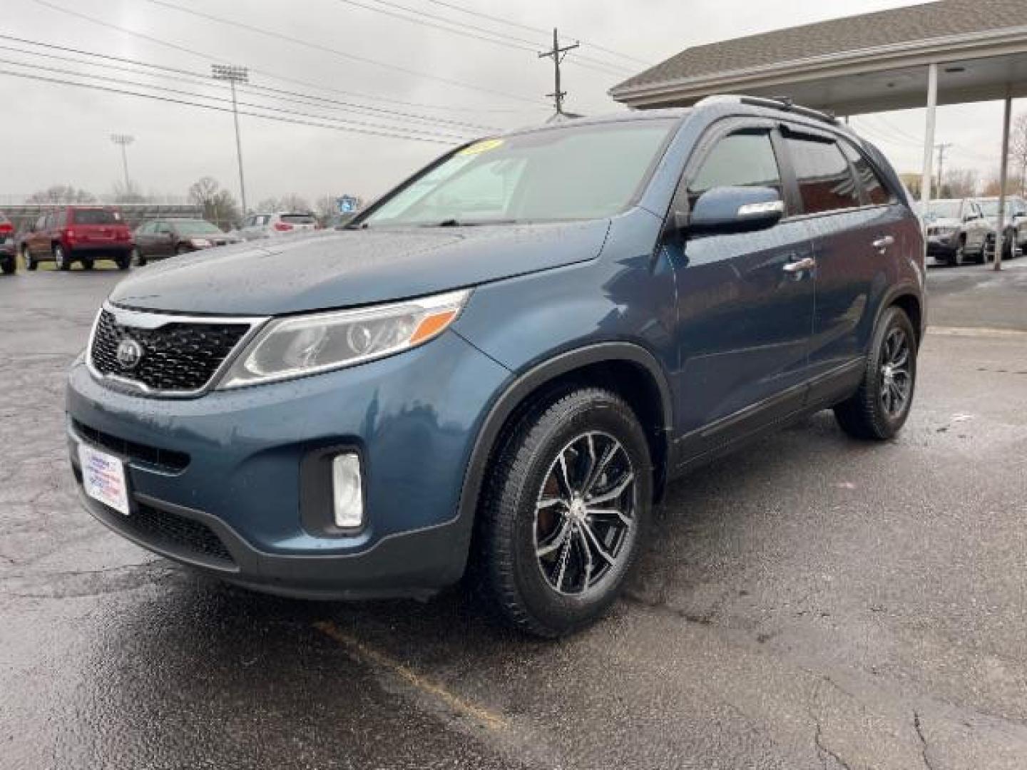 2014 Blue Kia Sorento LX 2WD (5XYKT3A64EG) with an 2.4L L4 DOHC 16V engine, 6-Speed Automatic transmission, located at 1099 N County Rd 25A , Troy, OH, 45373, (937) 908-9800, 40.057079, -84.212883 - Photo#1