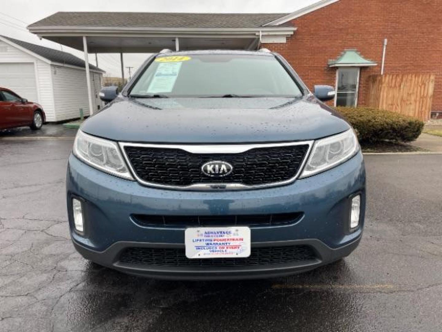 2014 Blue Kia Sorento LX 2WD (5XYKT3A64EG) with an 2.4L L4 DOHC 16V engine, 6-Speed Automatic transmission, located at 1099 N County Rd 25A , Troy, OH, 45373, (937) 908-9800, 40.057079, -84.212883 - Photo#4