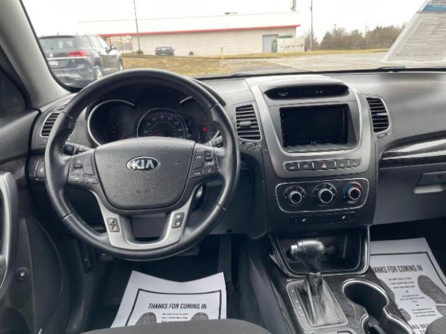 2014 Blue Kia Sorento LX 2WD (5XYKT3A64EG) with an 2.4L L4 DOHC 16V engine, 6-Speed Automatic transmission, located at 1099 N County Rd 25A , Troy, OH, 45373, (937) 908-9800, 40.057079, -84.212883 - Photo#6