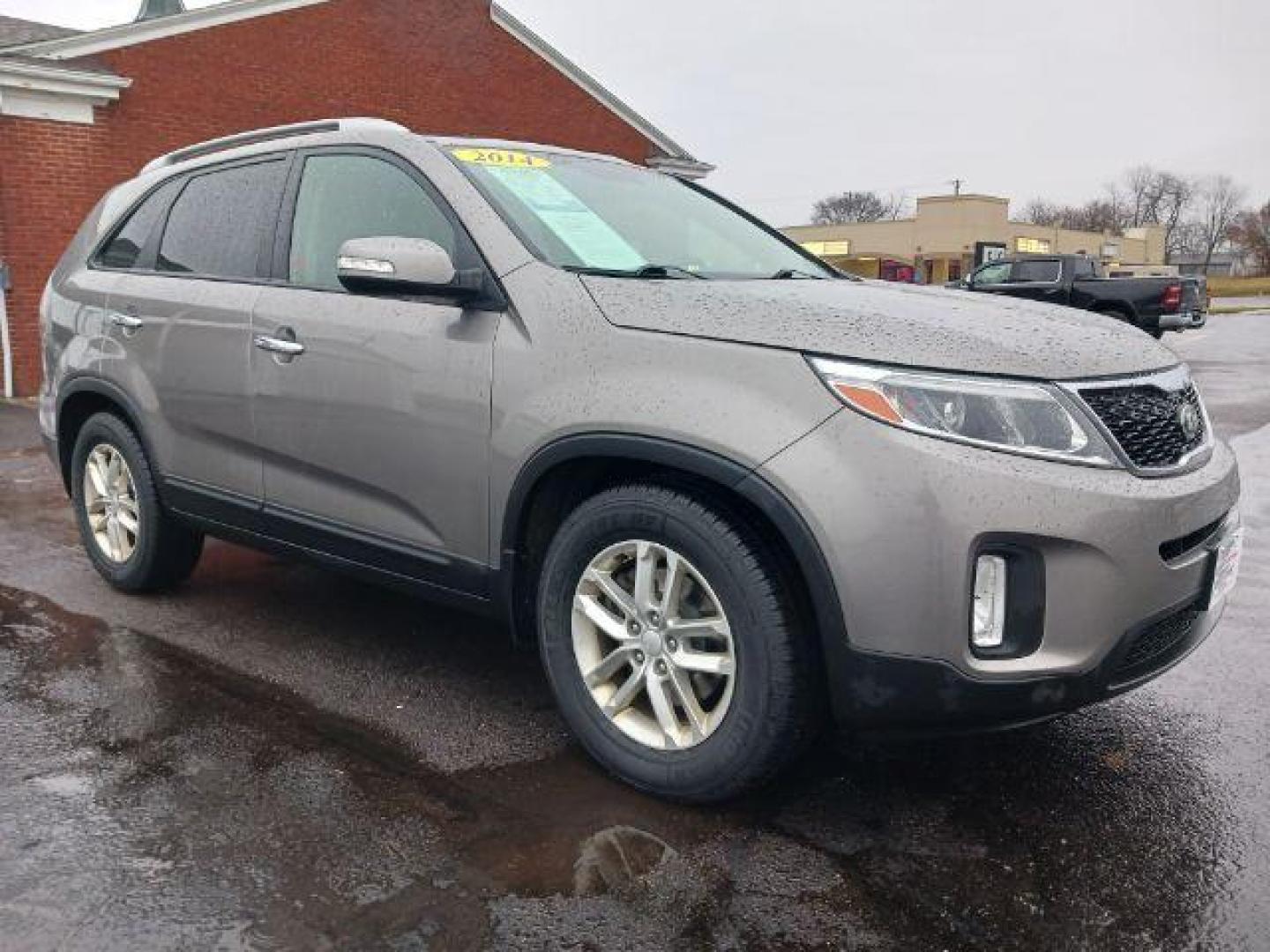 2014 Brown Kia Sorento LX 2WD (5XYKT4A61EG) with an 2.4L L4 DOHC 16V engine, 6-Speed Automatic transmission, located at 4508 South Dixie Dr, Moraine, OH, 45439, (937) 908-9800, 39.689976, -84.218452 - Photo#0