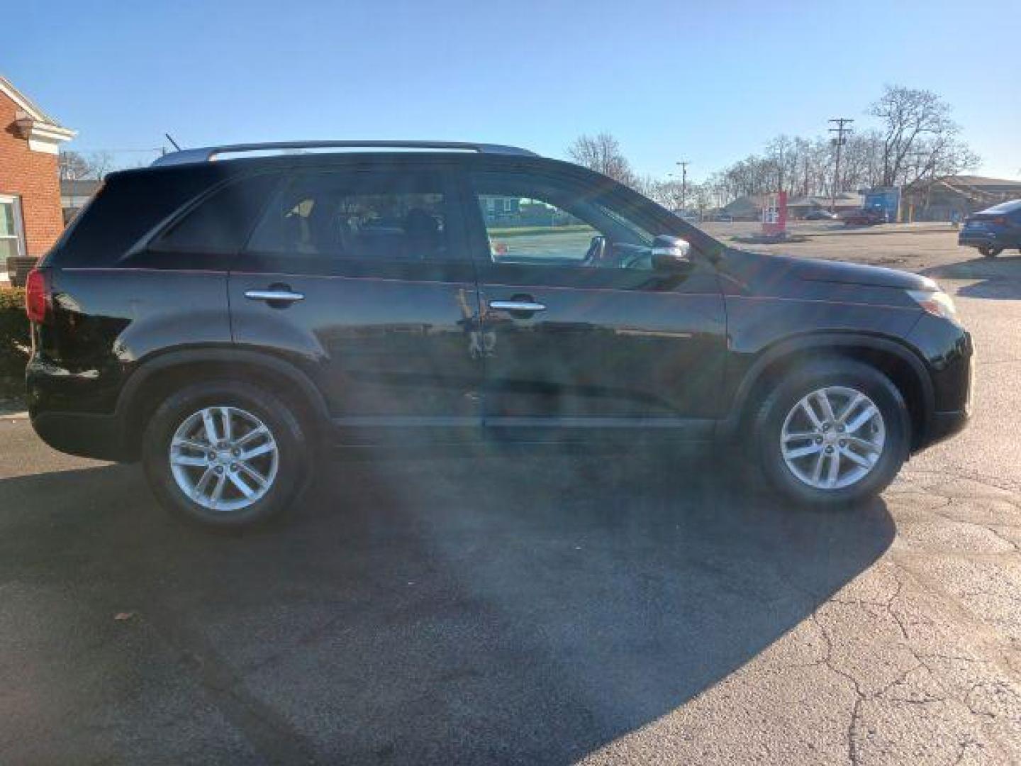 2014 Black Kia Sorento LX 2WD (5XYKT4A60EG) with an 2.4L L4 DOHC 16V engine, 6-Speed Automatic transmission, located at 1951 S Dayton Lakeview Rd., New Carlisle, OH, 45344, (937) 908-9800, 39.890999, -84.050255 - Photo#4