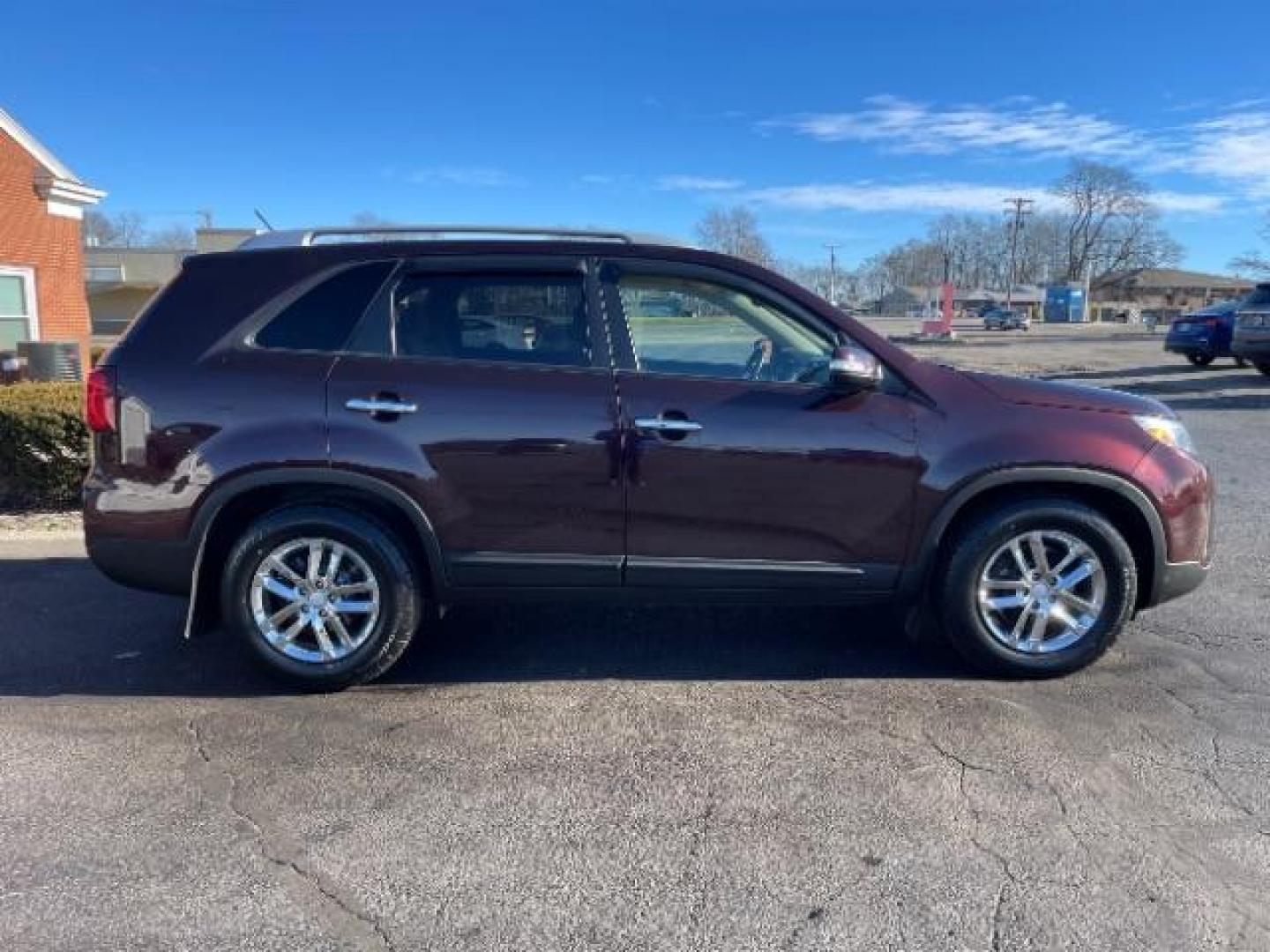 2014 Maroon Kia Sorento LX 2WD (5XYKT3A6XEG) with an 2.4L L4 DOHC 16V engine, 6-Speed Automatic transmission, located at 4508 South Dixie Dr, Moraine, OH, 45439, (937) 908-9800, 39.689976, -84.218452 - Photo#3