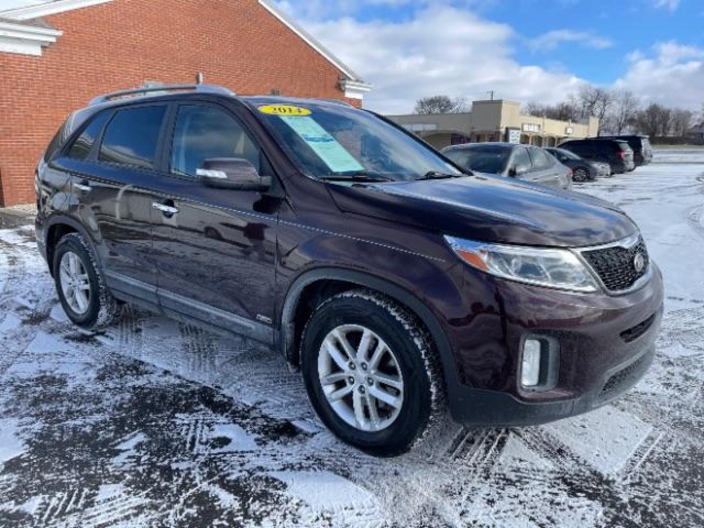 2014 Dark Cherry Kia Sorento LX AWD (5XYKTCA63EG) with an 2.4L L4 DOHC 16V engine, 6-Speed Automatic transmission, located at 1230 East Main St, Xenia, OH, 45385, (937) 908-9800, 39.688026, -83.910172 - Photo#0