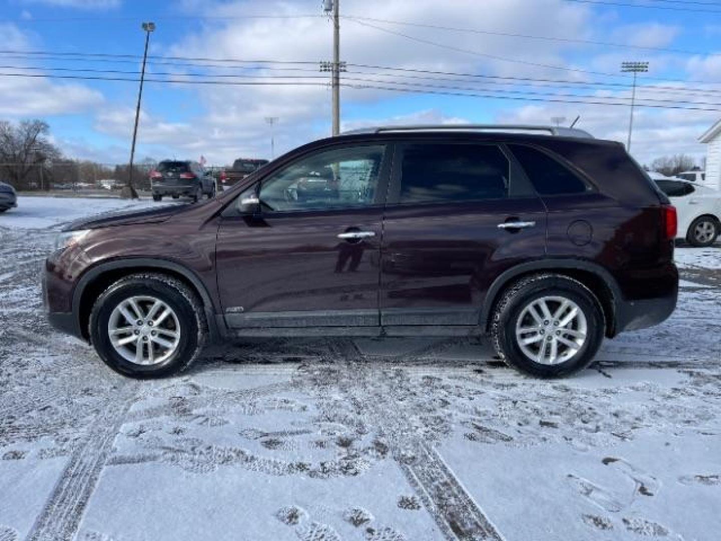 2014 Dark Cherry Kia Sorento LX AWD (5XYKTCA63EG) with an 2.4L L4 DOHC 16V engine, 6-Speed Automatic transmission, located at 1230 East Main St, Xenia, OH, 45385, (937) 908-9800, 39.688026, -83.910172 - Photo#2