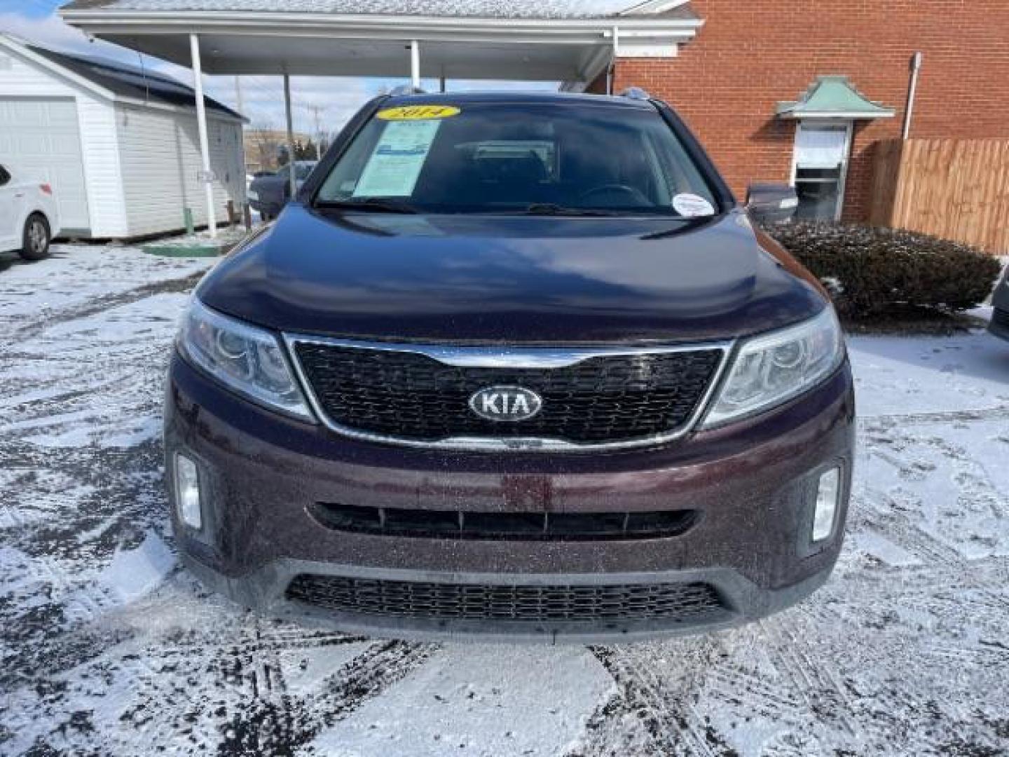 2014 Dark Cherry Kia Sorento LX AWD (5XYKTCA63EG) with an 2.4L L4 DOHC 16V engine, 6-Speed Automatic transmission, located at 1230 East Main St, Xenia, OH, 45385, (937) 908-9800, 39.688026, -83.910172 - Photo#5