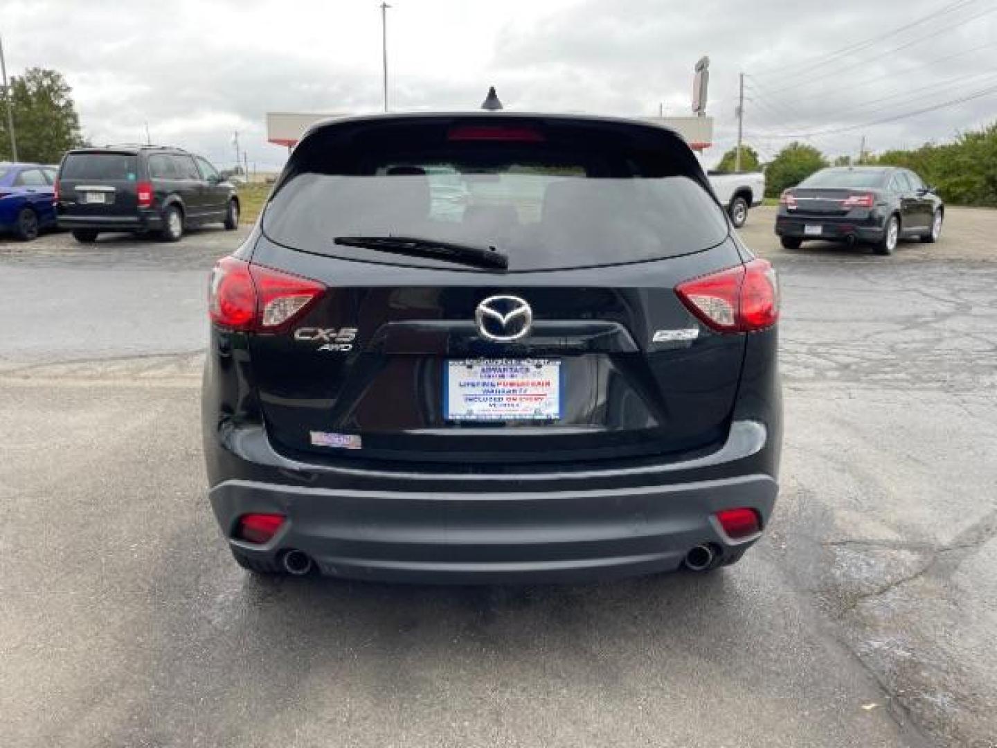 2014 Jet Black Mica Mazda CX-5 Touring AWD (JM3KE4CY2E0) with an 2.5L L4 DOHC 16V engine, 6-Speed Automatic transmission, located at 1230 East Main St, Xenia, OH, 45385, (937) 908-9800, 39.688026, -83.910172 - Photo#3