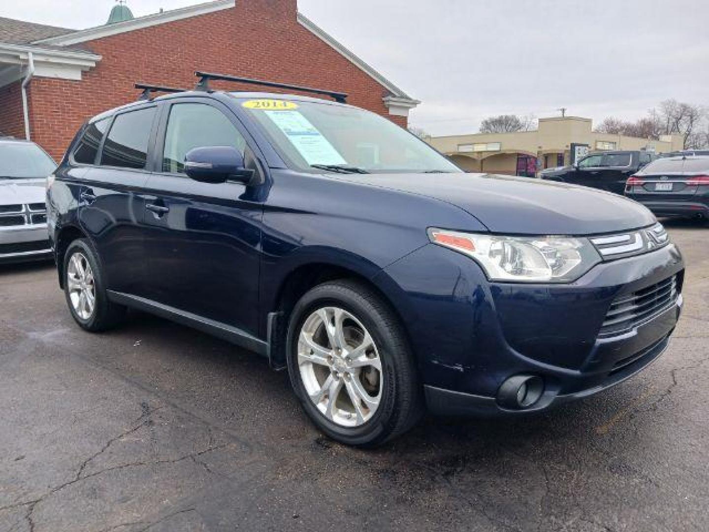 2014 Cosmic Blue Metallic Mitsubishi Outlander SE S-AWC (JA4AZ3A32EZ) with an 2.4L L4 DOHC 16V engine, 6-Speed Automatic transmission, located at 4508 South Dixie Dr, Moraine, OH, 45439, (937) 908-9800, 39.689976, -84.218452 - Photo#0