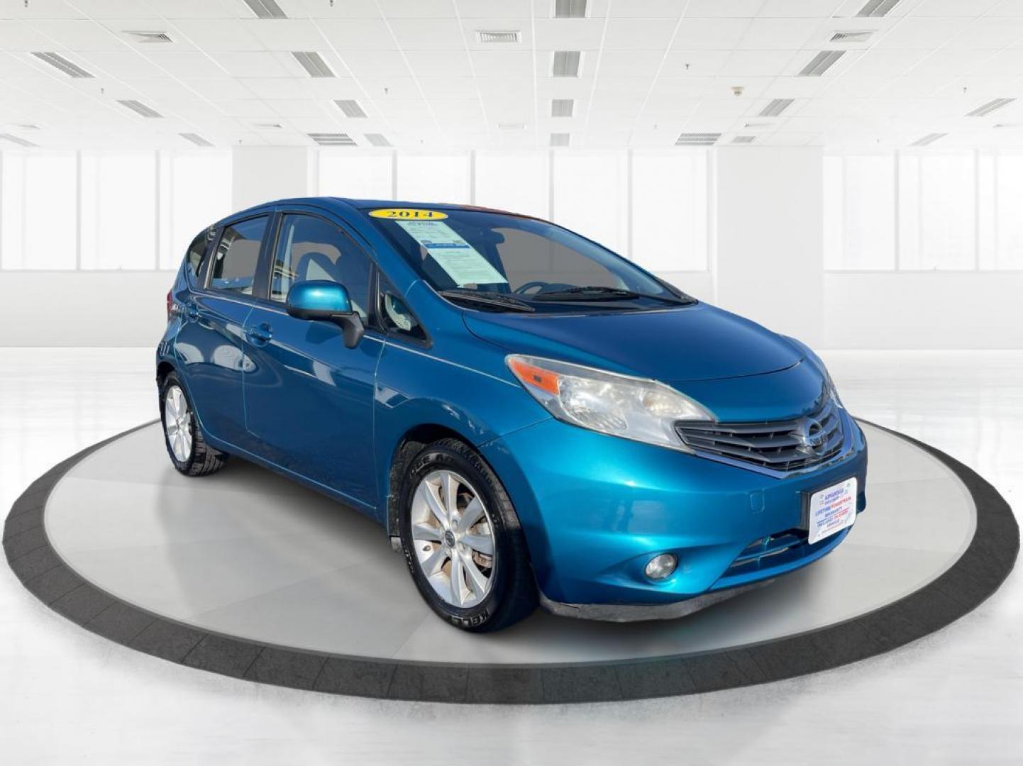 2014 Metallic Blue Nissan Versa Note S (3N1CE2CP8EL) with an 1.6L L4 DOHC 16V engine, 5-Speed Manual transmission, located at 1099 N County Rd 25A , Troy, OH, 45373, (937) 908-9800, 40.057079, -84.212883 - Photo#0