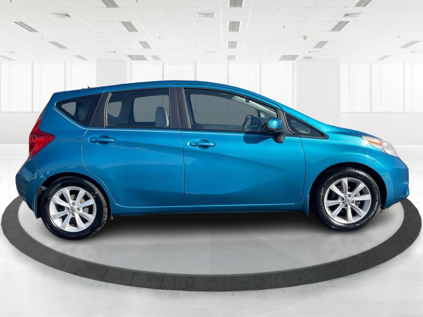 2014 Metallic Blue Nissan Versa Note S (3N1CE2CP8EL) with an 1.6L L4 DOHC 16V engine, 5-Speed Manual transmission, located at 1099 N County Rd 25A , Troy, OH, 45373, (937) 908-9800, 40.057079, -84.212883 - Photo#1