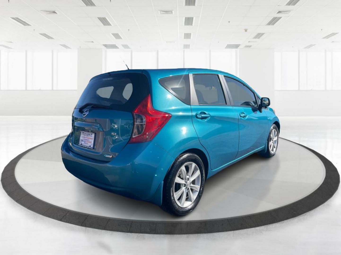 2014 Metallic Blue Nissan Versa Note S (3N1CE2CP8EL) with an 1.6L L4 DOHC 16V engine, 5-Speed Manual transmission, located at 1099 N County Rd 25A , Troy, OH, 45373, (937) 908-9800, 40.057079, -84.212883 - Photo#2