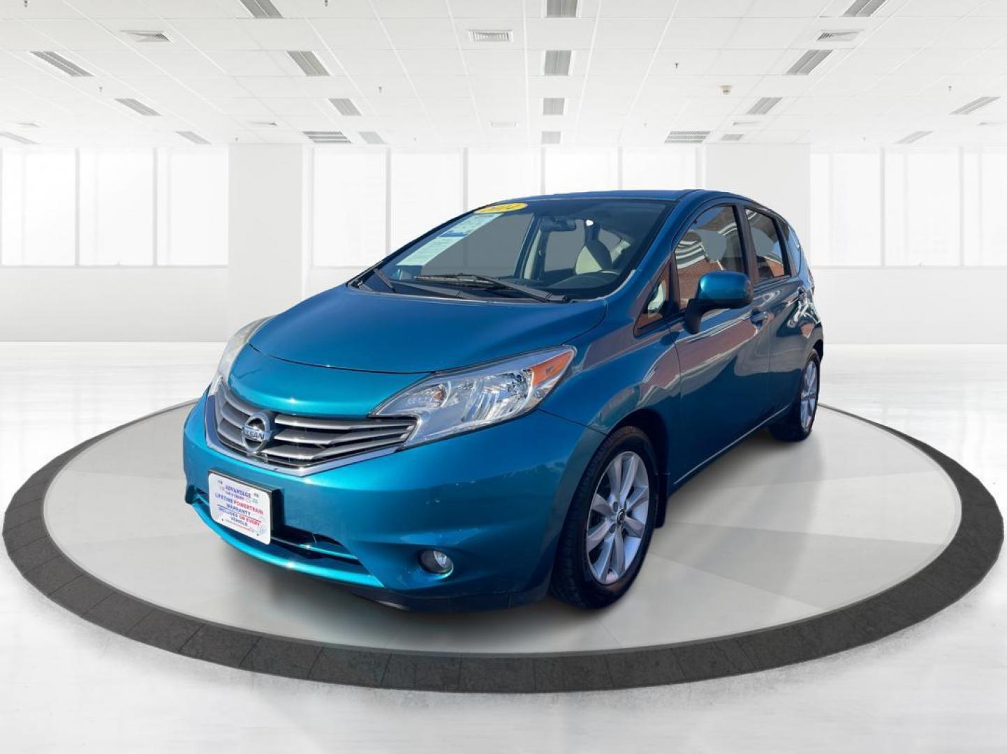 2014 Metallic Blue Nissan Versa Note S (3N1CE2CP8EL) with an 1.6L L4 DOHC 16V engine, 5-Speed Manual transmission, located at 1099 N County Rd 25A , Troy, OH, 45373, (937) 908-9800, 40.057079, -84.212883 - Photo#7