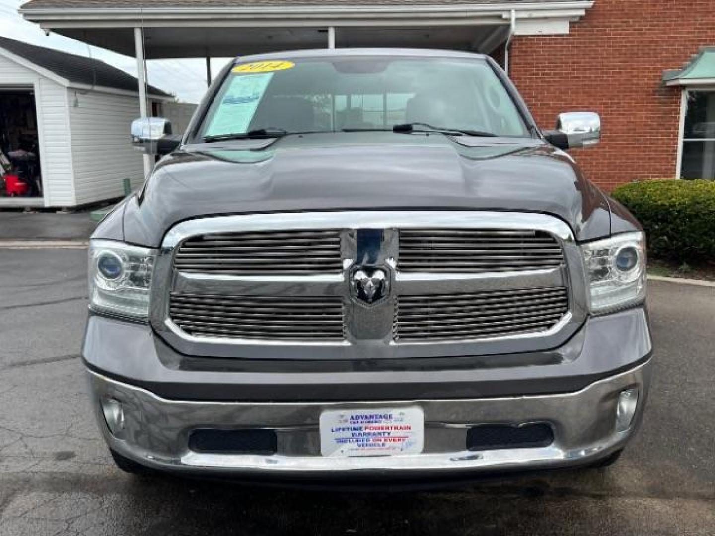 2014 Granite Crystal Met CC RAM 1500 Laramie Crew Cab SWB 4WD (1C6RR7NTXES) with an 5.7L V8 OHV 16V engine, 8-Speed Automatic transmission, located at 1184 Kauffman Ave, Fairborn, OH, 45324, (937) 908-9800, 39.807072, -84.030914 - Photo#1