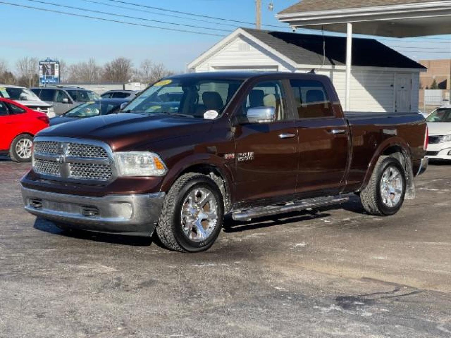 2014 Western Brown RAM 1500 Laramie Crew Cab LWB 4WD (1C6RR7VT1ES) with an 5.7L V8 OHV 16V engine, 8-Speed Automatic transmission, located at 1951 S Dayton Lakeview Rd., New Carlisle, OH, 45344, (937) 908-9800, 39.890999, -84.050255 - Photo#1