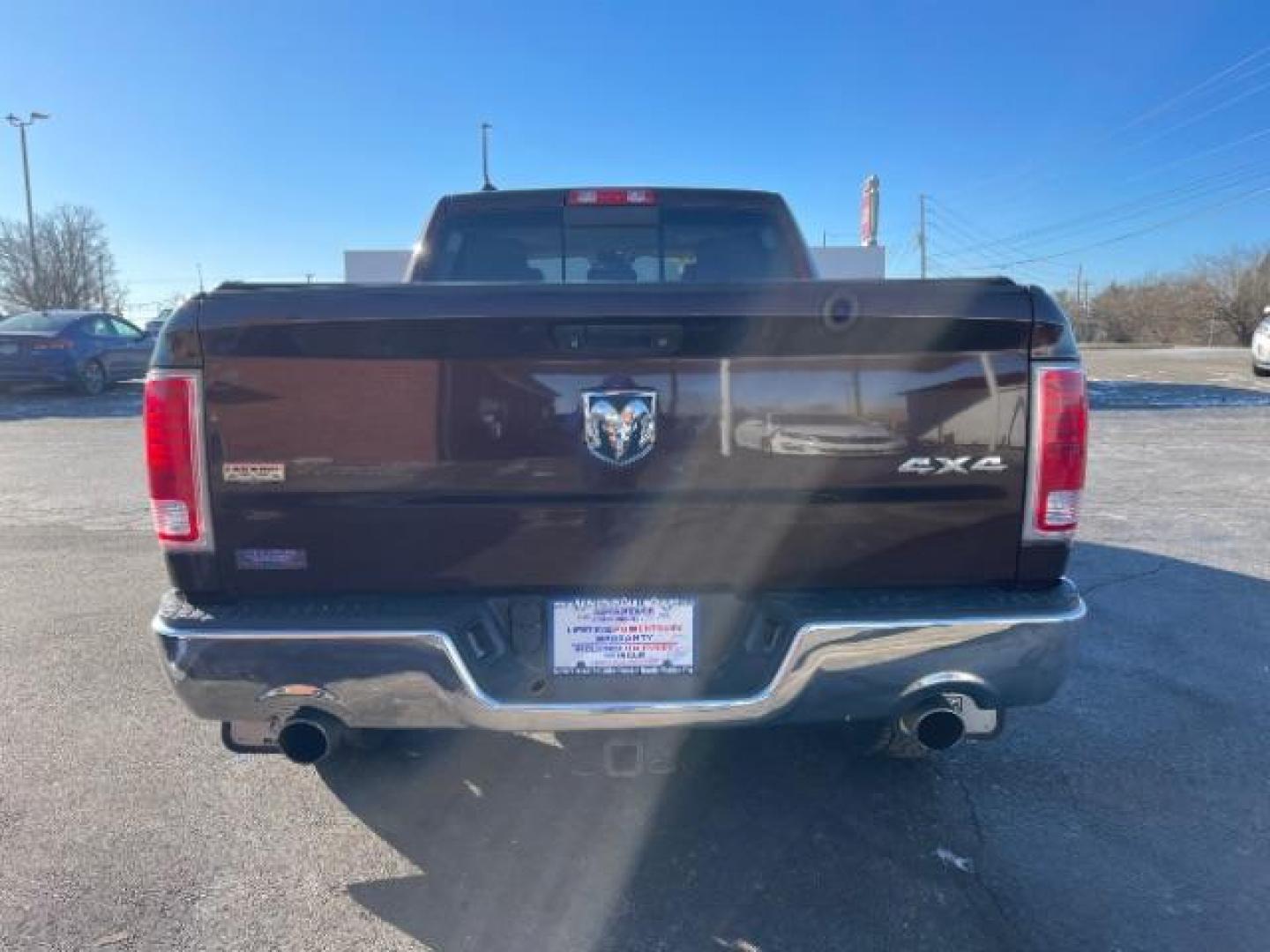 2014 Western Brown RAM 1500 Laramie Crew Cab LWB 4WD (1C6RR7VT1ES) with an 5.7L V8 OHV 16V engine, 8-Speed Automatic transmission, located at 1951 S Dayton Lakeview Rd., New Carlisle, OH, 45344, (937) 908-9800, 39.890999, -84.050255 - Photo#4