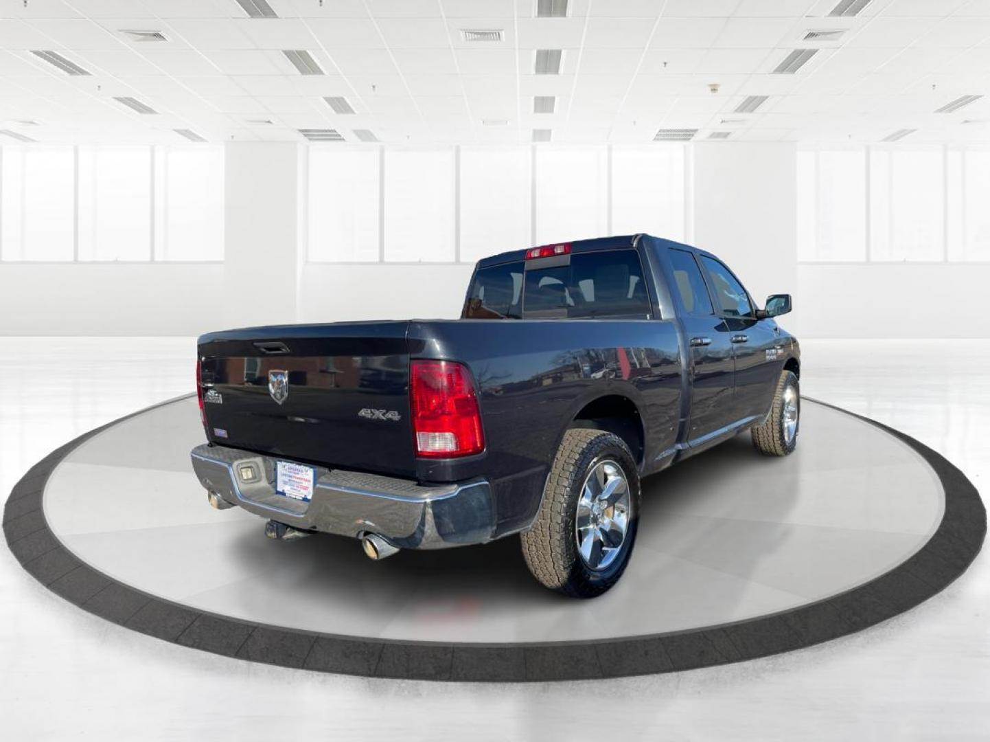 2014 Ram 1500 SLT Quad Cab 4WD (1C6RR7GT7ES) with an 5.7L V8 OHV 16V engine, 8-Speed Automatic transmission, located at 1230 East Main St, Xenia, OH, 45385, (937) 908-9800, 39.688026, -83.910172 - Photo#2