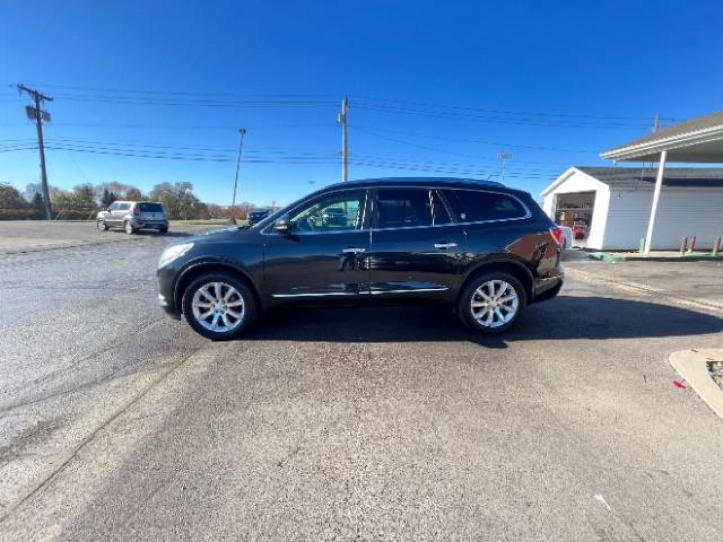 2015 Carbon Black Metallic Buick Enclave Premium FWD (5GAKRCKD4FJ) with an 3.6L V6 DOHC 24V engine, 6-Speed Automatic Overdrive transmission, located at 1951 S Dayton Lakeview Rd., New Carlisle, OH, 45344, (937) 908-9800, 39.890999, -84.050255 - Photo#3